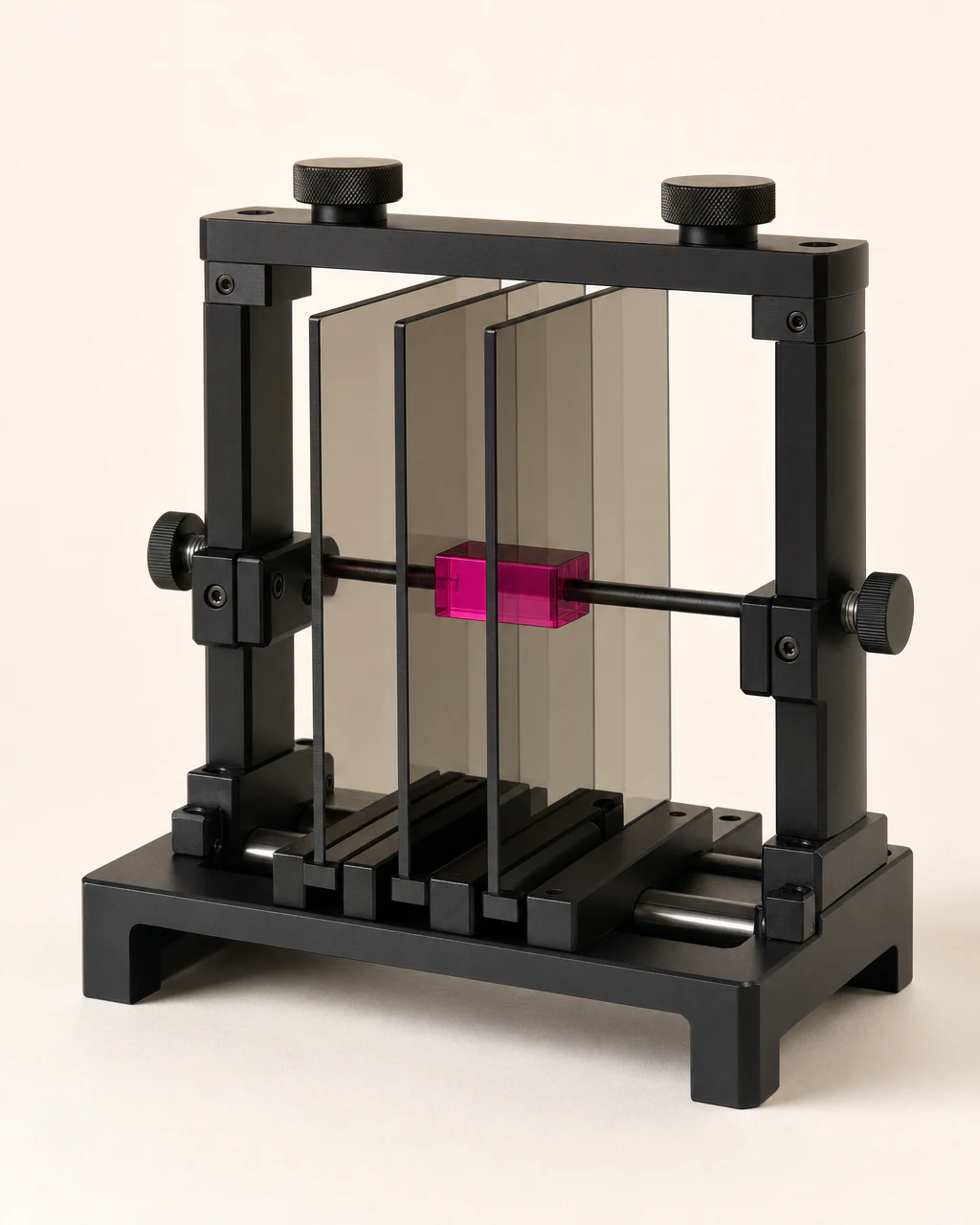 A black website registration jig aligning three smoked-glass planes with one magenta calibration key